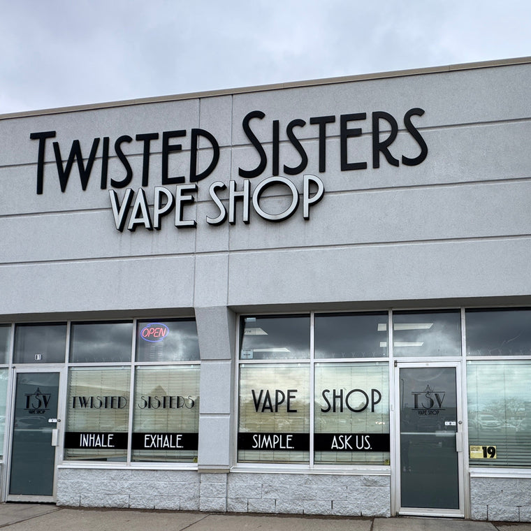 Twisted Sisters Vape Shop exterior with large sign on building facade.